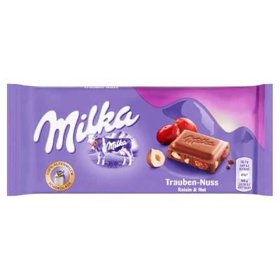 Milka alpesi tejcsokoládé mazsolával és mogyoródarabokkal 100 g